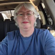 How can a club ask to transfer to a neighboring district?