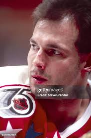 Montreal Canadiens goalie, Andre Racicot, sees the puck coming right...  News Photo