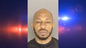 Suspect arrested in Warren Street shooting