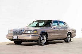 Image result for Light Prairie Tan 1998 Town Car