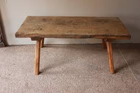 With clean classic lines and beautifully turned legs, this console is crafted of pine in a painted finish and comes with a slatted top and lower shelf. Primitive Butcher Block Coffee Table Coffee Table Tables