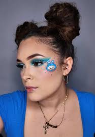 A Girl Thats Doing Her Makeup with A Labubu