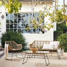 White textural finish highlights the weatherworn feel of the wood tones and purposeful nail holes. Oahu Outdoor Coffee Table