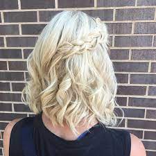 This Half Up Half Down Hairstyle With Loose Waves A Dutch Braid To The Side Is The Perfect Way To Spice Up Your Summ Half Up Hair Down Hairstyles Hair Styles