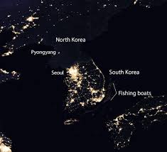 Résultat de recherche d'images pour "photo of north korea at night from space"