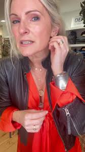 #ootd Spicey Orange Mila dress black Rucy leather jacket kenova boots and  layered necklaces😁