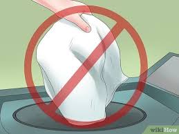 Use half a capful of detergent, and do not use fabric softener. How To Wash Towels With Pictures Wikihow