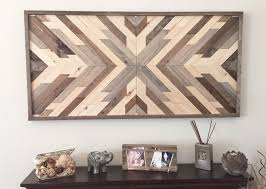 There are many different ways to use weathered wood in interior design and one option is to cover up the walls with it, like in this log. Reclaimed Wood Wall Art Rustic Wall Art Barn Wood Wall Art Farmhouse Decor Wall Decor Wood Wood Wall Design Reclaimed Wood Wall Art Rustic Wood Wall Decor