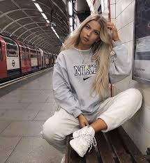 In A Rough Sense The Athleisure Style Describes Ensembles Which Mix Together Exercise Wear With Cas Sweater Fashion Comfy Fall Outfits Vintage Nike Sweatshirt