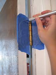 Push the screws into a piece of styrofoam. How To Paint A Door Without Taking It Off The Hinges Ugly Duckling House