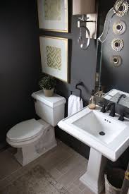 If you prefer painting over wallpapering, consider stenciling the upper half of a powder room. Pedestal Sink For Small Powder Room Home Harmony
