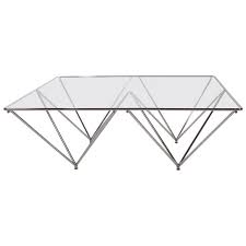 Welded, enameled, iron rods make up the base, with a 1/2 thick glass top. Pin On Aubrey S Spanish Style 70s Modern Lounge