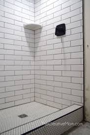 Natalie From The Blog The Creative Mom Partnered With The Home Depot And Pfister For A Bathroom Renovation See P Shower Renovation Shower Tile Bath Renovation
