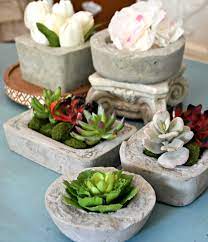 Here's a written and video tutorial for this fun diy. These Diy Concrete Planters Cost Just 1 To Make Hip2save