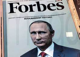 HELSNKI, FINLAND - OCTOBER 2, 2018: A Forbes magazine issue with Russian  President Putin s portrait