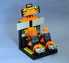 Avengers Arcade Black Widow And Captain America Playing A Motorcycle Racing Game Lego Custom Minifigures Lego Creative Lego Creations