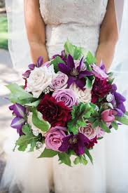 Red purple and white flower bouquets for wedding. Gorgeous Wedding Bouquet Featuring Purple Clematis Red Violet Dahlias Cream Lavender Violet Ro Winter Wedding Bouquet Bridesmaid Bouquet Wedding Bouquets