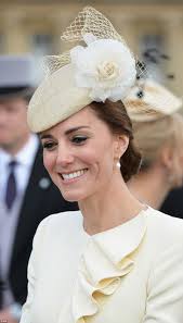 Kate Middleton dons the same cream coat she wore for Prince George's  christening