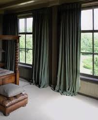 Design Black And Beige Curtains Walda Pairon The Doyenne Of Belgian Design Remodelista Green Curtains Bedroom Black Walls Living Room Curtains Living Room