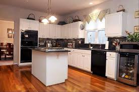 How black appliances look in a cream colored kitchen. Off White Kitchen Cabinets Black Appliances Instaimage
