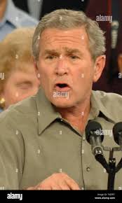 President George W. Bush (R) speaks to a crowded Republican rally in the  Georgia National Fairgrounds & Agricenter's Reeves Arena in Perry, Ga.,  October 31, 2006. The rally was held to bolster