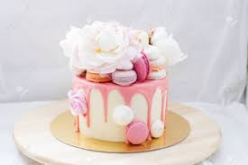 Flower birthday cake for same day flower delivery from sendflowers. Birthday Cake Decorated With Melted Pink Chocolate Fresh Peony Stock Photo Picture And Royalty Free Image Image 147627844