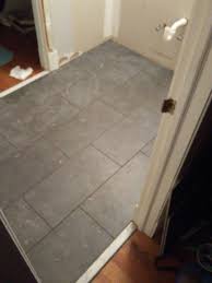 In Progress 12 X24 Floor Tile Laid In 1 3 Staggered Pattern Tile Floor Bathroom Floor Tiles Bathroom Flooring