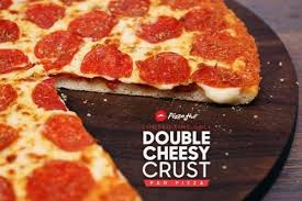For A Limited Time Only Pizza Hut Is Promoting The New Double Cheesy Crust Pan Pizza This Large 1 Topping Pizza Cheesy Crust Food Restaurant Recipes Famous