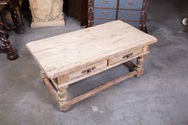 The gorgeous solid wood table offers rustic farmhouse style. Lolo French Antiques Country French Bleached Wood Coffee Table With Drawers Lolo French Antiques Et More