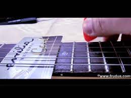 You also want to check the action of the other strings to make sure the saddle is radiused correctly according to the radius of the fretboard. Setup The Action Of Your Guitar In 3 Minutes Strings Height Youtube
