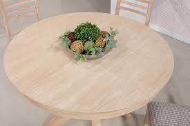 Retrouvez notre sélection de tables salle à manger : Table Ronde Contemporaine Romain Diametre 120 Cm Realisee En Chene Avec Un Pieds Central Et 1 Allonge Portefeuille De 50 Cm Woodsolid
