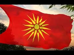 The macedonian flag can be described as a golden sun resting on top of a red field. The Flag Of The Republic Of Macedonia Between 1992 And 1995 Youtube