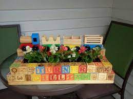I Wanted Something To Put Flowers In At Turner S Grave But Nothing Seemed Right For A Baby So I Made This Cemetery Decorations Grave Decorations Boy Decor
