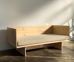 Minimalist Couch With Cushion In 2020 Couch Design Wooden Couch Transforming Furniture