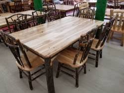 Bar stools made of wood; Rustic Cabin Dining Room Furniture Black River Furniture Outlet