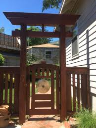 These posts don't have to be very high; Torii Gate And Fence Completed Project Asiatisch Garten Portland Maine Von Maine Porch Pergola Company Houzz