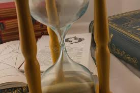 Astrology Books And Hourglass In Psychic Office Editorial