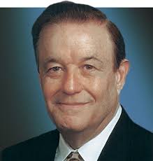 Executive pay still rising despite energy's downturn