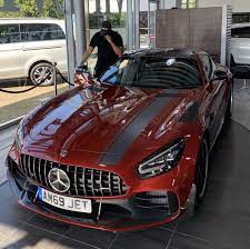 mercedes benz amg gtr pro painted in hyacinth red w exposed carbon fiber satin black accents photo taken b mercedes amg gt r mercedes benz amg mercedes amg