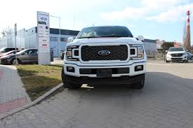 • lock all the vehicle doors without a key. Ford F 150 Lariat Ford Series