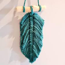 ***the feathers pictured in the listing are made with rustic white cotton cord, hung on a branch.*** add whimsy and warmth into your house with this small hippie/boho. Teal Macrame Feather Wall Hanging Doodledash Home Lifestyle
