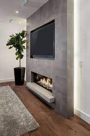 A stone fireplace extends upwards to encase the flat screen tv and include it in the center decor. Best Fireplace Tv Wall Ideas The Good Advice For Mounting Tv Above Fireplace Shairoom Com Recessed Electric Fireplace Fireplace Design Home Fireplace