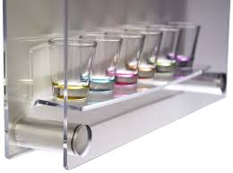 This case will hold 42 glasses, eight tall ones and thirty four short ones. Shot Glass Shelves Clear Acrylic With Aluminum Standoffs