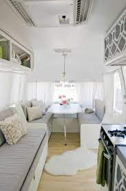 This new travel trailer boasts tons of storage throughout with sleek finishes! Bright Airstream Interior Caravane Deco Interieur Airstream Caravane