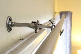 An Easy Way To Hide Vertical Blinds Vertical Blinds Curtains Over Blinds Home Living Room