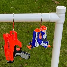 Attach 2 hooks spaced about the same length as your nerf gun for each gun you want to store and hang them over the hooks for quick, efficient storage. Diy Nerf Gun Storage Rack The Handyman S Daughter