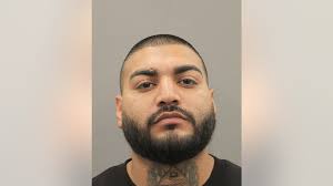 Houston shooting: Man charged in parking lot shooting that killed 1,  injured another