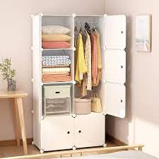 I know this isn't for everyone (although i do wonder why not sometimes) but consider it before you dismiss it. Amazon Com Small Bedroom Wardrobe Simple Wardrobe Space Saving Storage Cabinet Drawer Type Storage Cabinet And Storage Combination Wardrobe 5 Grids 1 Hanging Kitchen Dining
