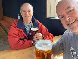 Nothing but a beer the ocean 🌊 and your best buddy chilling 🤙🐶