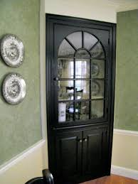 Black Paint Updates A Traditional Dining Room Corner Cabinet Dining Room Corner China Cabinets Corner Kitchen Cabinet